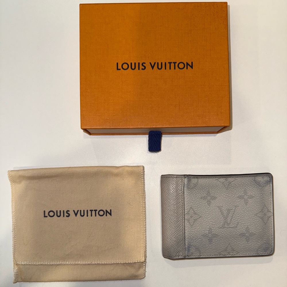 Used Louis Vuitton Monogram White and Gray Bifold Wallet